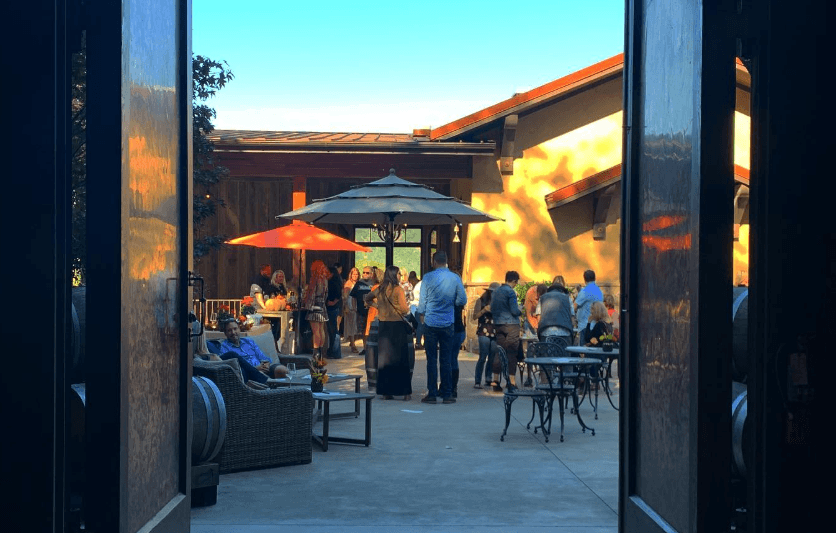 Evening event at Joseph Cellars patio with guests at sunset